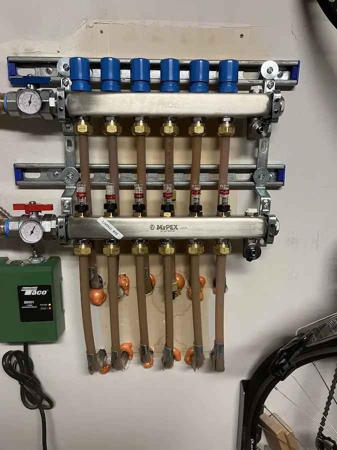 Plumber performing Water Heater Repair at a residential property in Big Lake